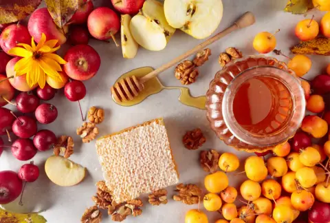 Honey, walnuts and small apples, healthy organic food_edited.png